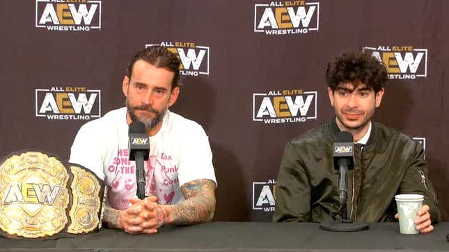 CM Punk and Tony Khan at the AEW media scrum,