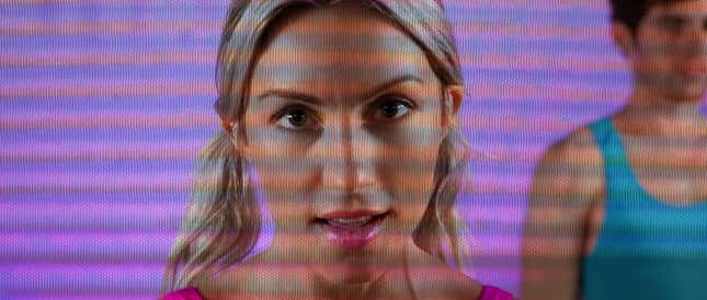 A woman in a retro aerobics video