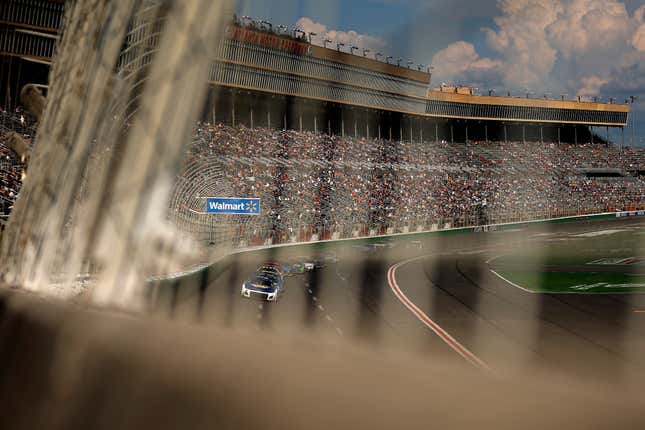 Chase Elliott, driver of the No. 9 NAPA Auto Parts Chevrolet, leads the field during the NASCAR Cup Series Quaker State 400 at Atlanta Motor Speedway on July 10, 2022 in Hampton, Georgia.