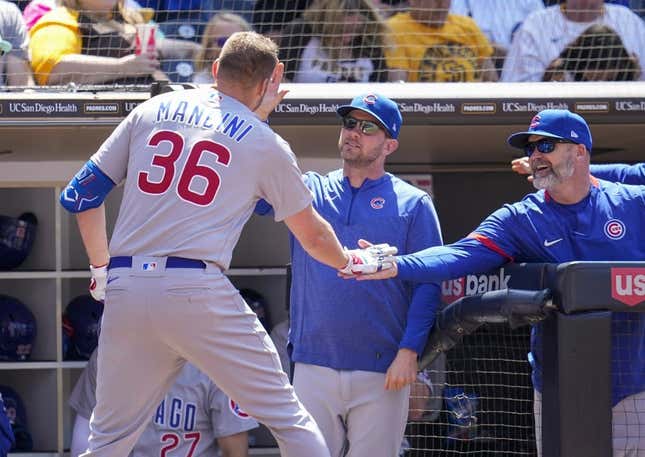 Jun 4, 2023; San Diego, California, USA; Chicago Cubs first baseman Trey Mancini (36) is congratulated by manager David Ross (3) after hitting a solo home run against the San Diego Padres during the second inning at Petco Park.