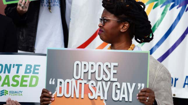 Ebonni Chrispin of AIDS Healthcare Foundation holds a sign during a press conference at the Florida state capital, hosted by Equality Florida, AIDS Healthcare Foundation and the Human Rights Campaign in opposition of HB 1577 (Don’t Say Gay bill) on Tuesday, February 15, 2022, in Tallahassee, Fla. 