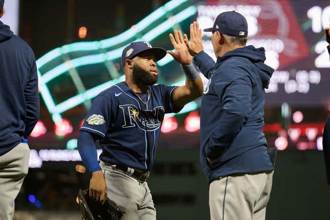 Aug 14, 2023; San Francisco, California, USA; Tampa Bay Rays infielder Osleivis Basabe (37) shakes hands with a coach after the final out of the ninth inning against the San Francisco Giants at Oracle Park.