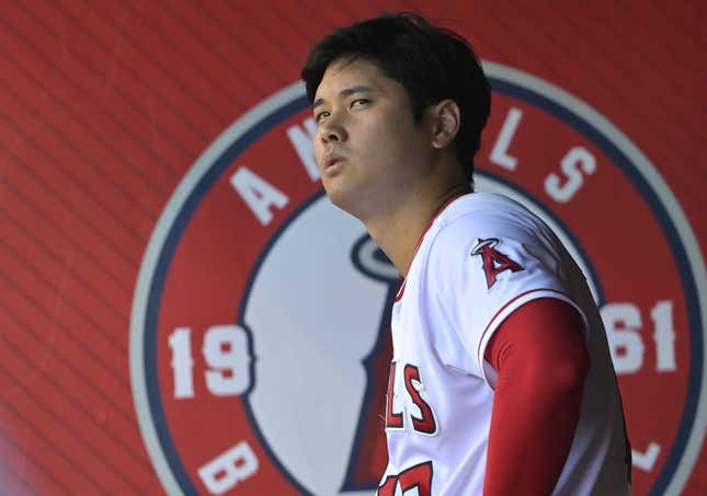 Aug 5, 2023; Anaheim, California, USA; Los Angeles Angels designated hitter Shohei Ohtani (17) looks on from the dugout during the game against the Seattle Mariners at Angel Stadium.