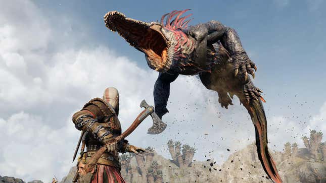 A giant lizard jumps at Kratos in God of War Ragnarok.