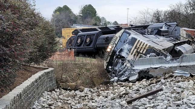 Image for article titled Watch a Train Get Completely Obliterated by a 134-Foot Concrete Beam