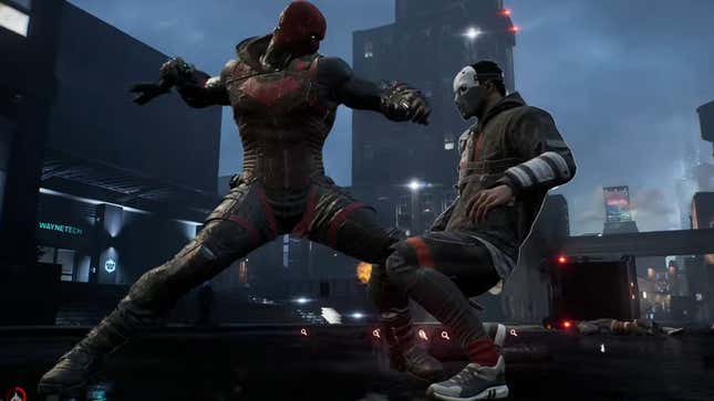 A Gotham Knights screenshot showing playable character Red Hood about to punch a Gotham City goon's lights out.