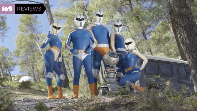 A five-person superhero team in matching blue outfits.