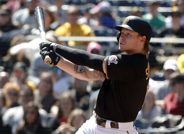 Apr 9, 2023; Pittsburgh, Pennsylvania, USA;  Pittsburgh Pirates center fielder Jack Suwinski (65) hits a sacrifice fly RBI against the Chicago White Sox during the second inning at PNC Park.
