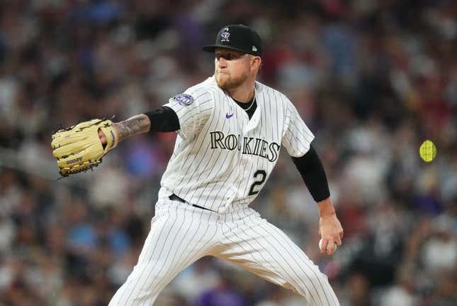 Apr 11, 2023; Denver, Colorado, USA; Colorado Rockies starting pitcher Kyle Freeland (21) delvers a pitch in the fifth inning against the St. Louis Cardinals at Coors Field.