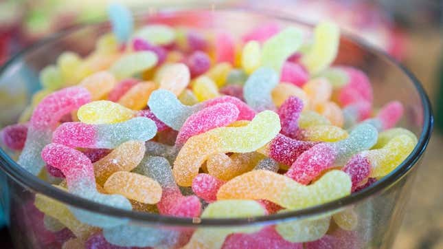 Bowl of sour gummy worms candy