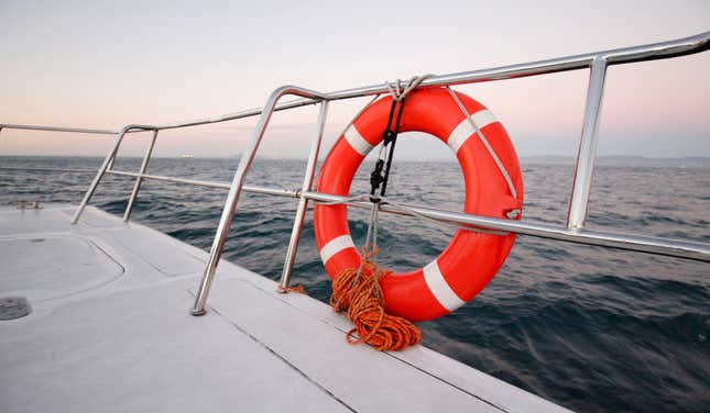 Life saving buoy on a boat at sea