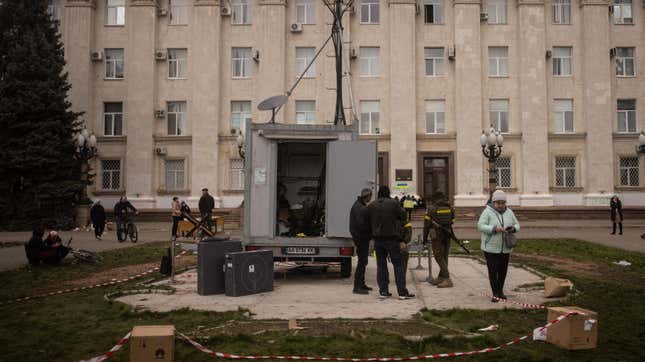 A Starlink device and a mobile cell tower are seen operating in the Kherson central square on November 16, 2022 in Kherson, Ukraine