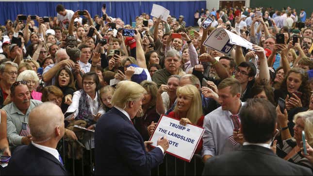“Trump = The Landslide Vote,” reads a sign at a rally in Anderson, South Carolina.