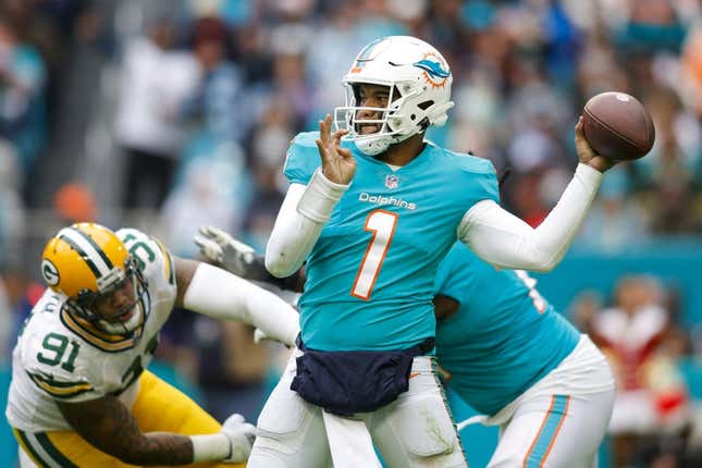 Dec 25, 2022; Miami Gardens, Florida, USA; Miami Dolphins quarterback Tua Tagovailoa (1) throws the football during the fourth quarter against the Green Bay Packers at Hard Rock Stadium.
