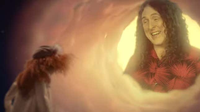 Weird Al Yankovic smiles down from heaven upon Sgt. Floyd Pepper.