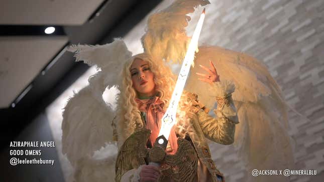A cosplayer shows off a feminine take on Good Omens' angelic Aziraphale, which includes a glowing sword.