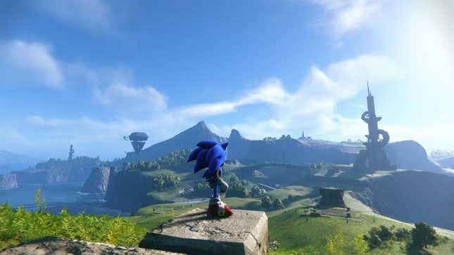 A screenshot of Sonic Frontiers showing Sonic looking out over a vast open plain dotted with ruins and trees. 