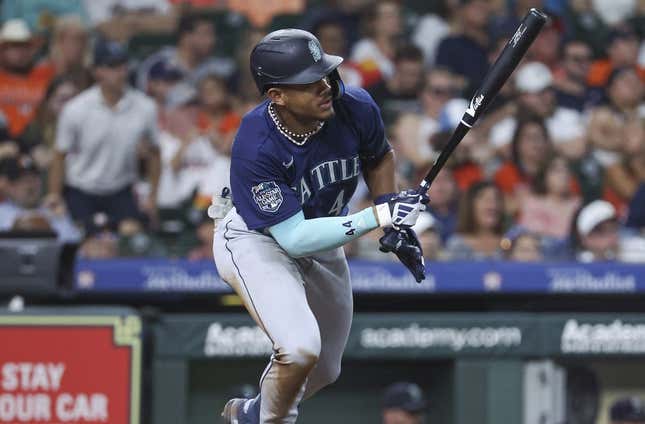 Jul 7, 2023; Houston, Texas, USA; Seattle Mariners center fielder Julio Rodriguez (44) drives in two runs with an RBI single during the fourth inning against the Houston Astros at Minute Maid Park.