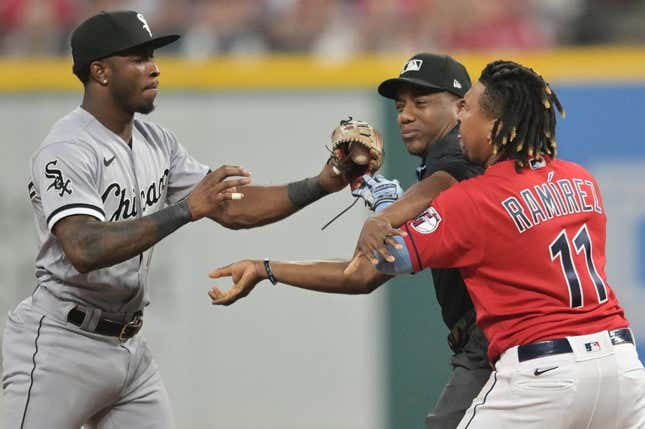Aug 5, 2023; Cleveland, Ohio, USA; Umpire Malachi Moore tries to separate Cleveland Guardians third baseman Jose Ramirez (11) and Chicago White Sox shortstop Tim Anderson (7) after Ramirez slid into second with an RBI double during the sixth inning at Progressive Field.
