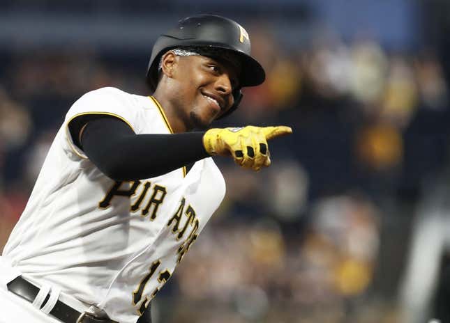 Sep 4, 2023; Pittsburgh, Pennsylvania, USA; Pittsburgh Pirates third baseman Ke'Bryan Hayes (13) gestures to the dugout as he circles the bases on a solo home run against the Milwaukee Brewers during the fifth inning at PNC Park.