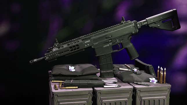 The ISO Hemlock assault rifle sits on three boxes of ammo.
