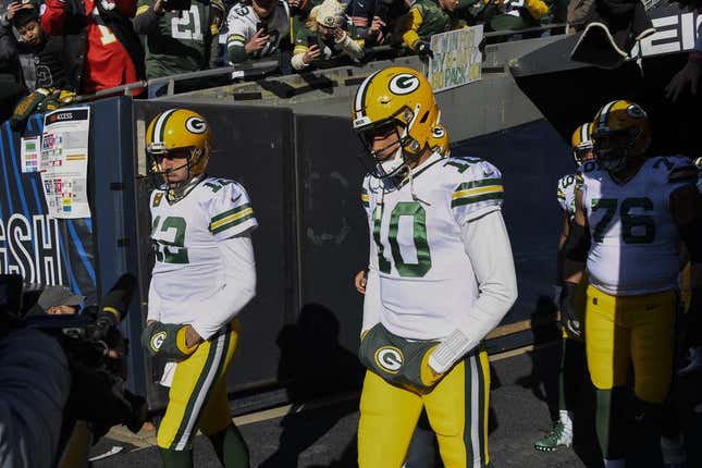 Dec 4, 2022; Chicago, Illinois, USA;  Green Bay Packers quarterback Aaron Rodgers (12) and quarterback Jordan Love (10) during warmups before a game against the Chicago Bears at Soldier Field.