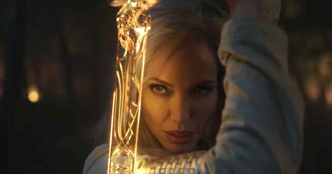 Angelina as Thena in Marvel's Eternals, wielding a glowing sword. 