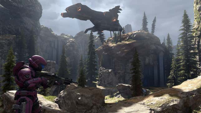 An image from Halo Infinite depicting a spartan roaming a rather empty, rocky environment while an airship flies overhead.