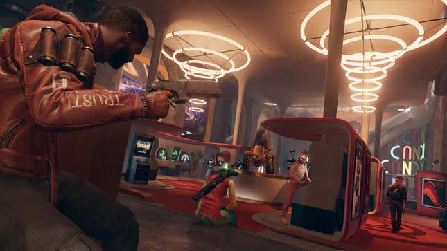 Deathloop protagonist Colt Vahn ducks behind cover in an arcade.