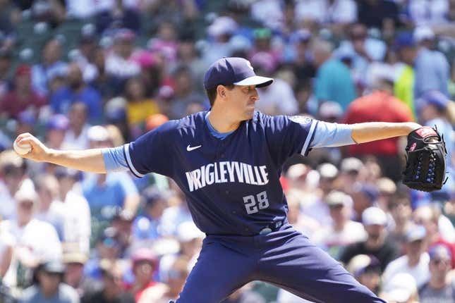 Aug 4, 2023; Chicago, Illinois, USA; Chicago Cubs starting pitcher Kyle Hendricks (28) throws the ball against the Atlanta Braves during the first inning at Wrigley Field.