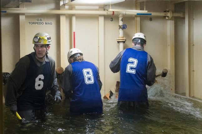 Three astronaut candidates try to plug a leak
