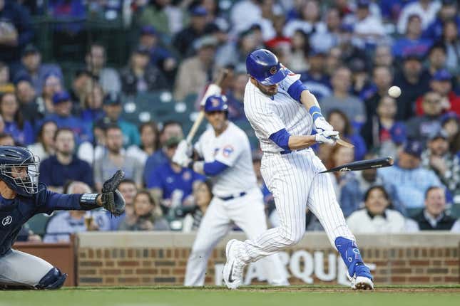 Apr 10, 2023; Chicago, Illinois, USA; Chicago Cubs third baseman Patrick Wisdom (16) breaks his bat as he bats against the Seattle Mariners during the second inning at Wrigley Field.