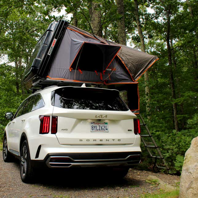 A photo of the rear of the Roofnest tent on top of a Kia SUV.