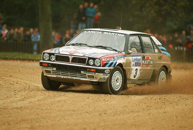 Juha Kankkunen of Finland in action in his Lancia Delta HF Integrale rally car during the 1990 RAC Rally of Great Britain.