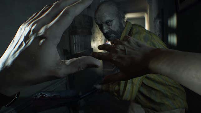 Ethan holds his hands up in Resident Evil 7.