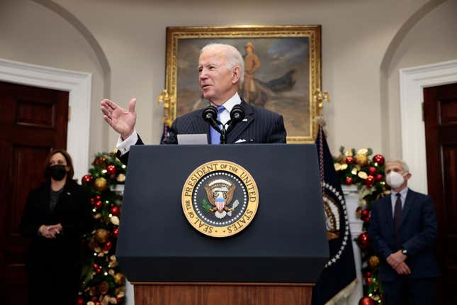 WASHINGTON, DC - NOVEMBER 29: U.S. President Joe Biden delivers remarks on the Omicron COVID-19 variant following a meeting with his COVID-19 response team, including U.S. Vice President Kamala Harris (L) and Anthony Fauci (R), Director of the National Institute of Allergy and Infectious Diseases and Chief Medical Advisor to the President, at the White House on November 29, 2021, in Washington, DC. 