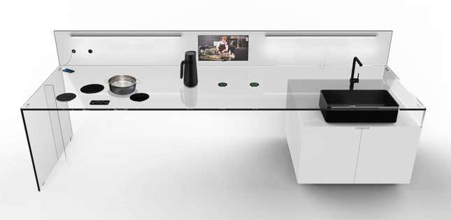 Image for article titled Electricity Conducting Glass Tables Are Probably Going to Be the Next Interior Design Fad