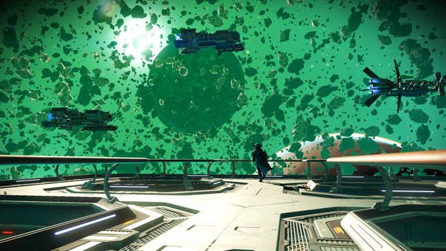 A character stands on a ship, looking out at an asteroid field in No Man's Sky.