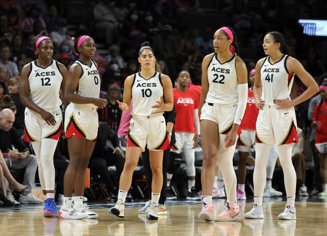 Chelsea Gray #12, Jackie Young #0, Kelsey Plum #10, A’ja Wilson #22 and Kiah Stokes #41 of the Las Vegas Aces walk back on the court after a timeout in their game against the Chicago Sky at Michelob ULTRA Arena on August 11, 2022 in Las Vegas, Nevada. (Photo by Ethan Miller/Getty Images)