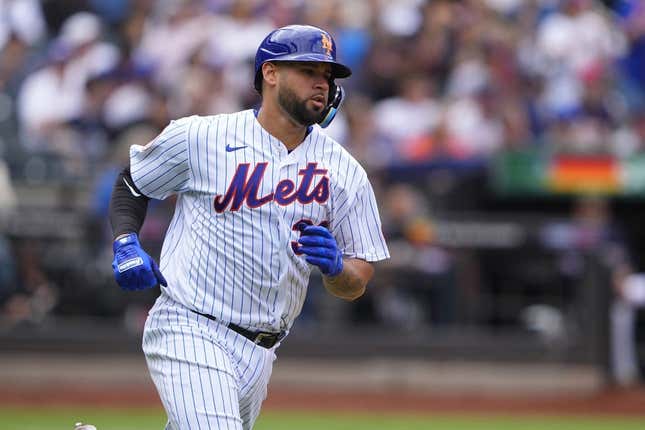 May 21, 2023; New York City, NY, USA; New York Mets catcher Gary Sanchez (33) runs after hitting a single against the Cleveland Guardians during the fourth inning