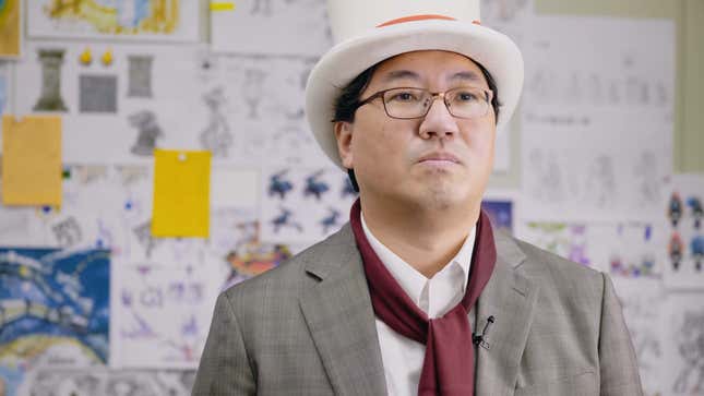 Yuji Naka wears a Balan Wonderworld hat.