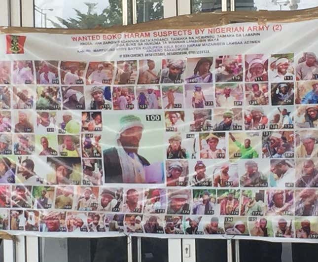 A poster on the university campus with photos of Boko Haram suspects.