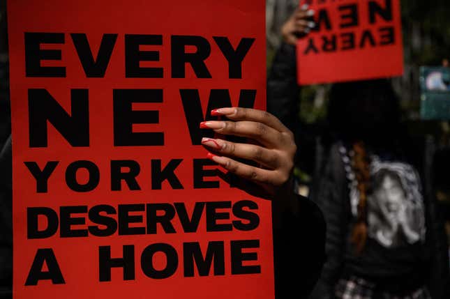 Activists, supporters, and members of the homeless community attend a protest calling for greater access to housing and better conditions at homeless shelters, outside City Hall in New York City on March 18, 2022.