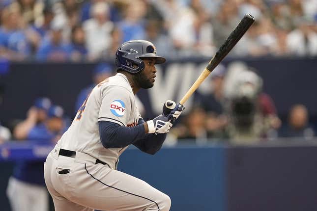 Jun 5, 2023; Toronto, Ontario, CAN; Houston Astros designated hitter Yordan Alvarez (44) hits an RBI single against the Toronto Blue Jays during the first inning at Rogers Centre.