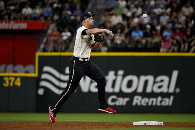 Aug 4, 2023; Arlington, Texas, USA; Texas Rangers shortstop Corey Seager (5) throws to first base during the third inning against the Miami Marlins at Globe Life Field.