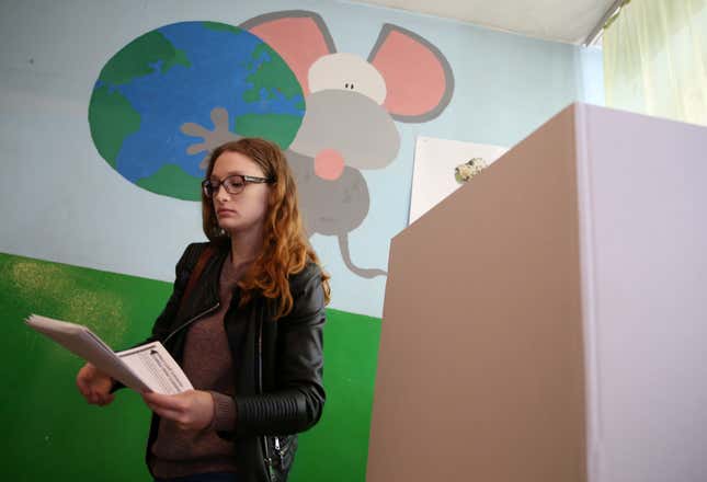 A woman casts her ballot during 2018 elections.