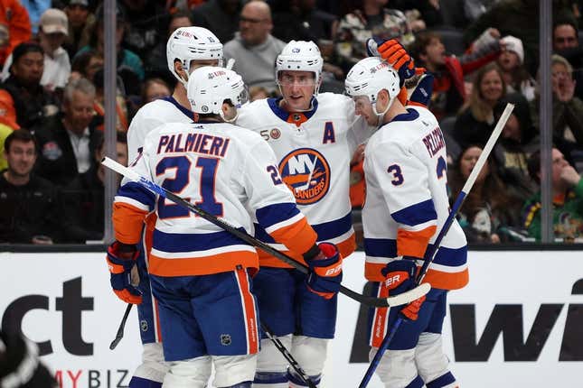 Mar 15, 2023; Anaheim, California, USA;  New York Islanders forward Brock Nelson (29) celebrates with teammates after scoring a goal during the second period against the Anaheim Ducks at Honda Center.