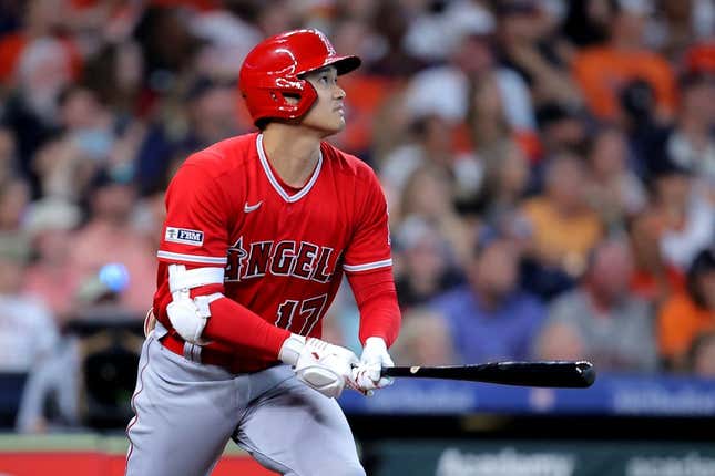 Aug 13, 2023; Houston, Texas, USA; Los Angeles Angels designated hitter Shohei Ohtani (17) hits a home run to center field against the Houston Astros during the sixth inning at Minute Maid Park.