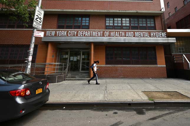 A man walks past the New York City Department of Health and Mental Hygiene in the Jamaica section of Queens, NY, August 2, 2022. New York City has declared a State of Emergency over Monkeypox as more than 1500 cases have been reported in the city. 

