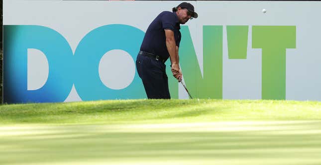 Should Phil Mickelson keep trying to put a positive spin on his LIV cash grab? The sign behind him has the answer.
